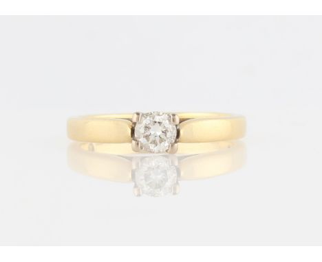 An 18ct yellow gold diamond solitaire ring, set with a central round brilliant cut diamond, measuring approx. 0.30ct, hallmar