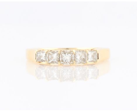 A five stone diamond ring, set with five graduated princess cut diamonds, total diamond weight approx. 0.56ct, set in unmarke