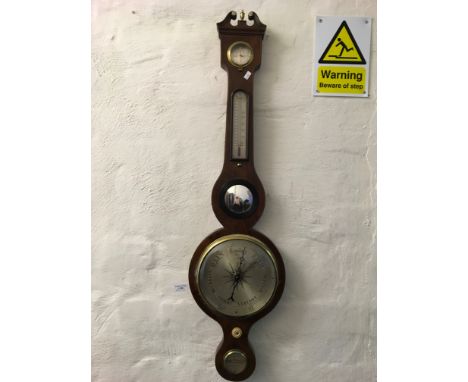 A mahogany, mercury filled, banjo style barometer