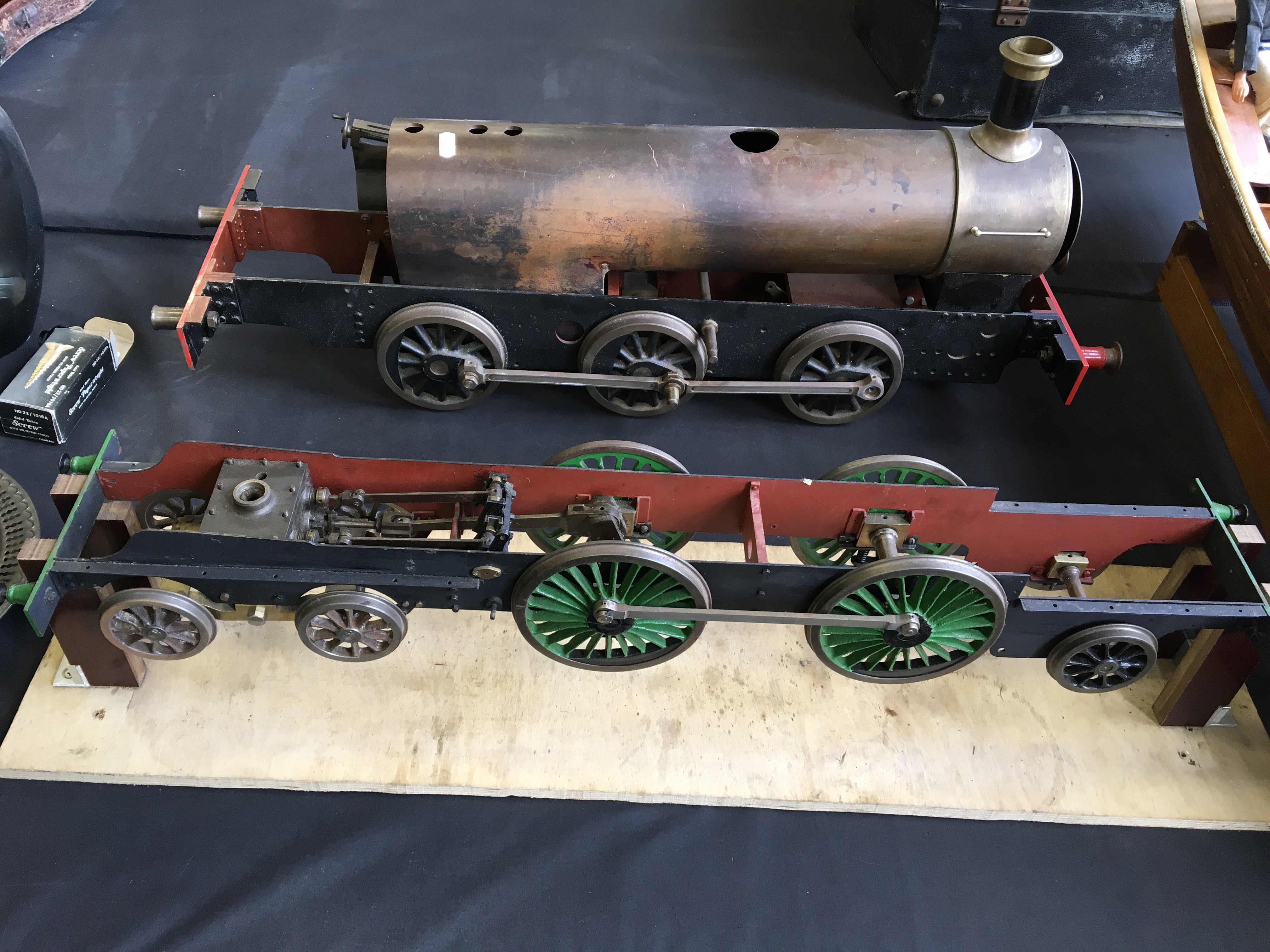 A quantity of model live steam engine parts to include four boxes of ...