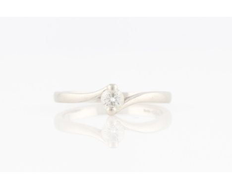 A platinum diamond solitaire ring, set with a round brilliant cut diamond, measuring approx. 0.25ct, hallmarked Birmingham, r