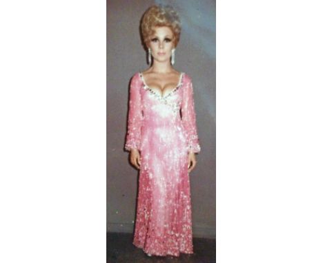 A Mitzi Gaynor gown worn on Perry Como's Winter Show, designed by Bob MackieNBC, 1971. Pink full-length long-sleeved gown ful