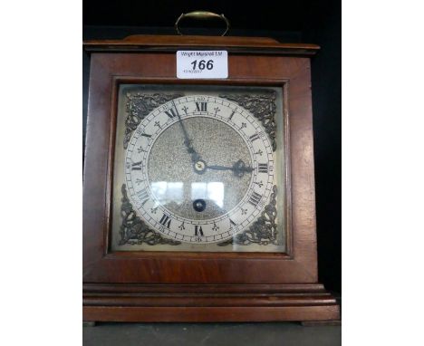 A Georgian style bracket clock.