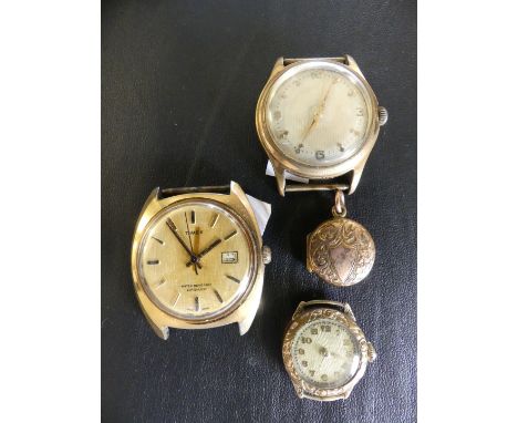 A vintage Timex automatic movement to with two further watch movements and a gold-plated locket 