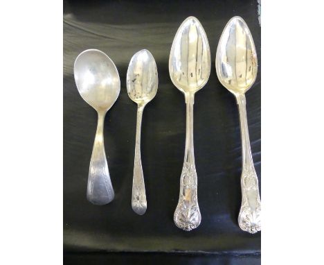 A Georgian Irish hallmarked silver rat tail spoon together with a continental silver ladle and two weight metal dinner spoons