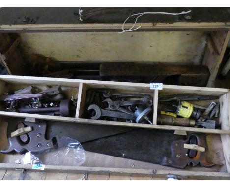 A collection of vintage woodworking tools to a pine joiners toolbox to include handsaws, planes and fittings.