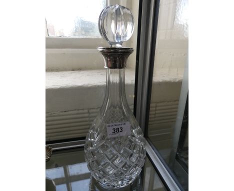 A Birmingham hallmarked silver collared cut glass decanter 