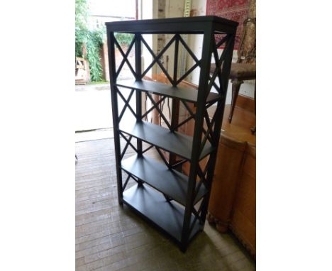 A good quality ebonised hardwood freestanding display shelf.