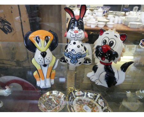 Three Lorna Bailey ceramic figures depicting the Easter bunny, cat and dog 