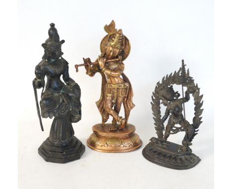 BRASS HINDU DEITY
standing on a lotus flower base surrounded by an arch of flames, 22.5cm high; a brass figure of a deity sea