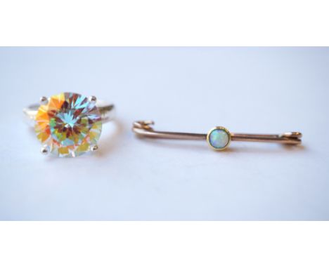 OPAL SET BAR BROOCH
in unmarked gold; and a CZ set silver ring