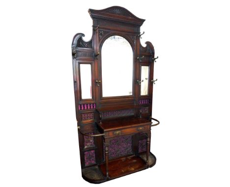 EDWARDIAN MAHOGANY HALL STAND
the shaped raised back with dentil moulding above an arched bevelled plate flanked by two recta