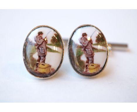 PAIR OF SILVER AND ENAMEL FISHING CUFFLINKS
each of the oval enamel panels depicting a fisherman on the riverbank, in box