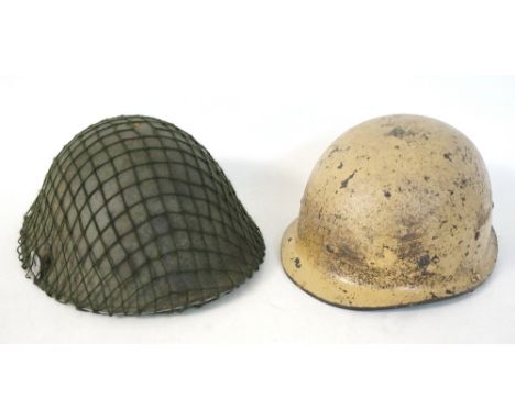 BRITISH MKIV ARMY STEEL HELMET
circa 1970's, with liner and net covering, and a period US Army helmet liner (2)  