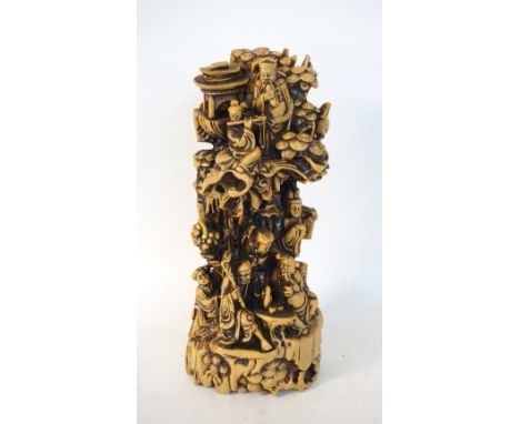 CHINESE RESIN STATUE OF A VILLAGE SCENE
depicting musicians, farmers and village elders in a naturalistic setting, 39.5cm hig