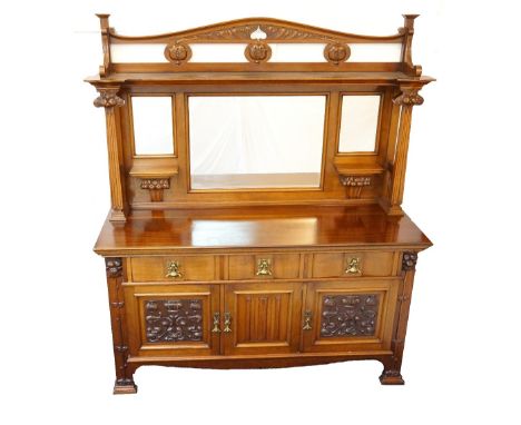 ART NOUVEAU MAHOGANY MIRROR BACK SIDEBOARD
with a shaped and pierced top above a shelf flanked by fluted carved columns, with