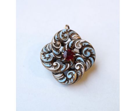 ENAMEL AND RED GEM SET BROOCH
the scroll decorated brooch decorated with light blue and white enamel around a round red gem s