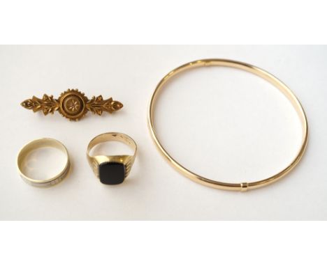 COLLECTION OF GOLD JEWELLERY
comprising a nine carat gold bangle, a Victorian diamond set fifteen carat gold brooch, a fourte