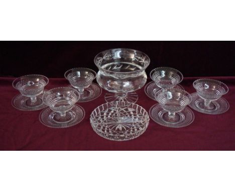 SET OF SIX CUT GLASS DESSERT DISHES
with hobnail cut bowls and raised on a circular foot, matching saucers, a large thistle s