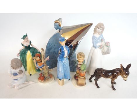 SMALL COLLECTION OF CERAMIC FIGURES
comprising a Royal Copenhagen figure of a young girl holding a doll, various marks and la