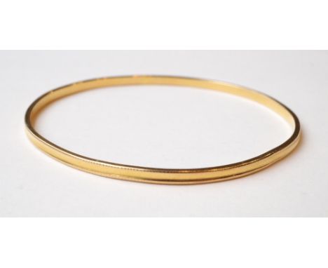 HIGH CARAT GOLD BANGLE 
with indistinct marks, approximately 12.9 grams