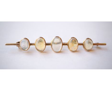 GRADUATED FIVE STONE OPAL BAR BROOCH
in unmarked gold