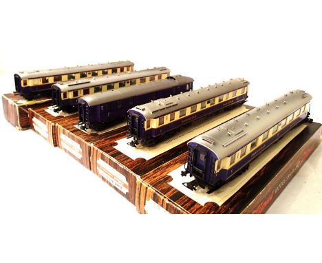 Five Liliput Rheingold, Mitropa Deutsche Reichsbahn coaches, purple/cream, six ladders missing in very good condition, boxes 