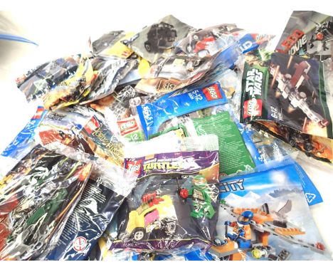 Thirty nine Lego kits in sealed bags. P&amp;P Group 3 (£25+VAT for the first lot and £5+VAT for subsequent lots) 