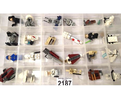 Box of twenty four assorted Lego advent calendar models and figures. P&amp;P Group 2 (£18+VAT for the first lot and £3+VAT fo