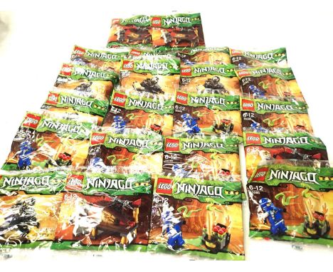 Twenty two Lego Ninjago figures in sealed packets. P&amp;P Group 2 (£18+VAT for the first lot and £3+VAT for subsequent lots)
