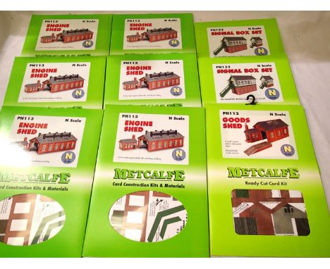 Nine N Gauge Metcalfe kits; six engine shed PN113, two signal box PN133, goods shed PN112, sealed packs. P&amp;P Group 1 (£14
