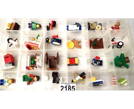 Box of twenty four assorted Lego advent calendar models and figures. P&amp;P Group 2 (£18+VAT for the first lot and £3+VAT fo