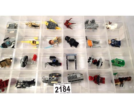 Box of twenty four assorted Lego advent calendar models and figures. P&amp;P Group 2 (£18+VAT for the first lot and £3+VAT fo