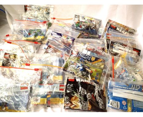 Approximately thirty five bagged Lego kits, all have been built and disassembled, appears complete. P&amp;P Group 3 (£25+VAT 