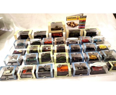 Thirty four OO scale Oxford diecast vehicles, cars, vehicles, vans, motorcycles, military etc, mostly in excellent condition,