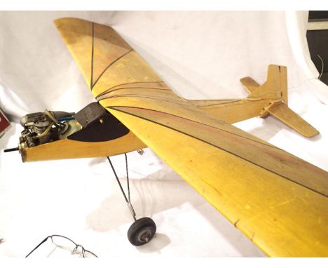 Balsa wood construction r/c high wing plane fitted with Thunder Tiger 15 engine, three servos and receiver, 90 cm wingspan, r