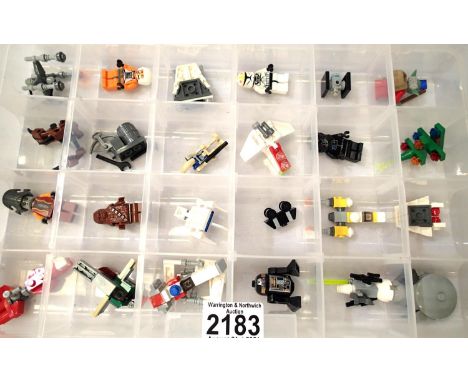 Box of twenty four assorted Lego advent calendar models and figures. P&amp;P Group 2 (£18+VAT for the first lot and £3+VAT fo