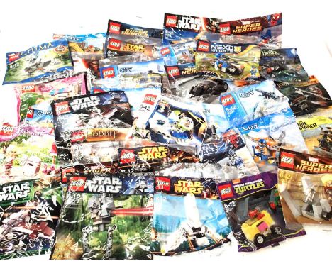 Thirty three Lego kits in sealed bags. P&amp;P Group 3 (£25+VAT for the first lot and £5+VAT for subsequent lots) 