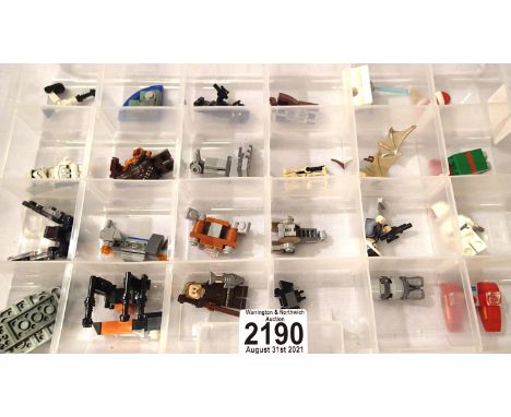 Box of twenty four assorted Lego advent calendar models and figures. P&amp;P Group 2 (£18+VAT for the first lot and £3+VAT fo