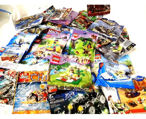 Thirty three Lego kits in sealed bags. P&amp;P Group 3 (£25+VAT for the first lot and £5+VAT for subsequent lots) 