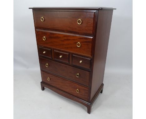 A modern chest of 3 short and 4 long drawers, on bracket feet, 82cm x 114cm x 47cm 