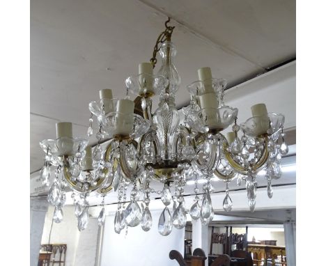A brass and glass 10-branch chandelier, with lustre drops 