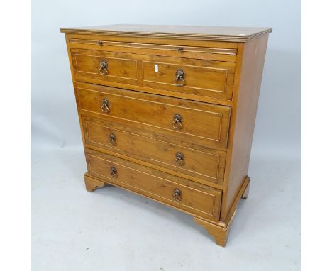 An early 20th century walnut chest of 4 long drawers with brushing slide, on bracket feet, 78cm x 84cm x 40cm 