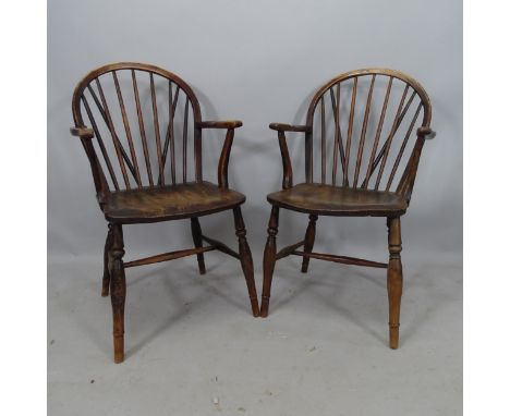 A pair of elm-seated stick-back elbow chairs 