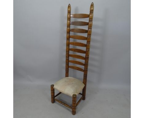 A mid-century French tall ladder-back chair, in the manner of Charles Dudouyt