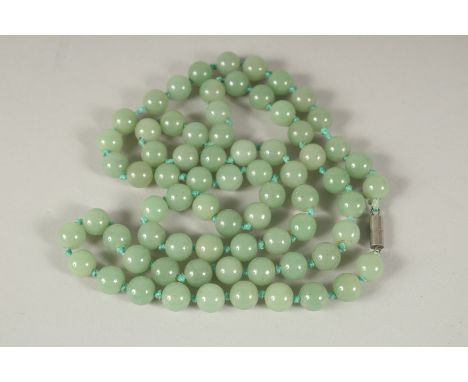 A GOOD JADE SEVENTY-TWO BEAD NECKLACE. 86cms long.