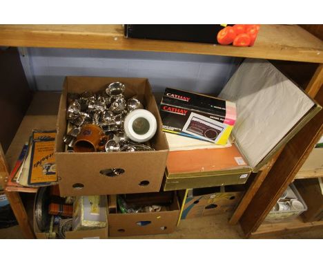 A shelf of silver plated items etc.