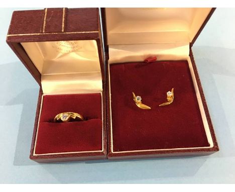 An 18ct gold diamond ring, together with matching earrings, size 'L', 5.8g