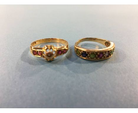 An 18ct gold ring, 2.2g and a 9ct gold ring, mounted with semi precious stones, 2.3g