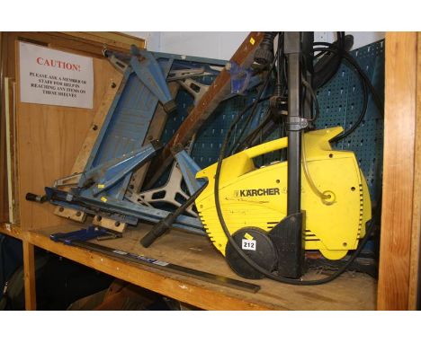 A Karcher jet washer, Black and Decker work bench etc.
